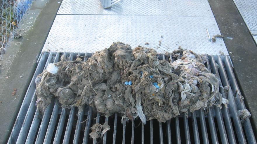 A large grey clump of disposable wipes