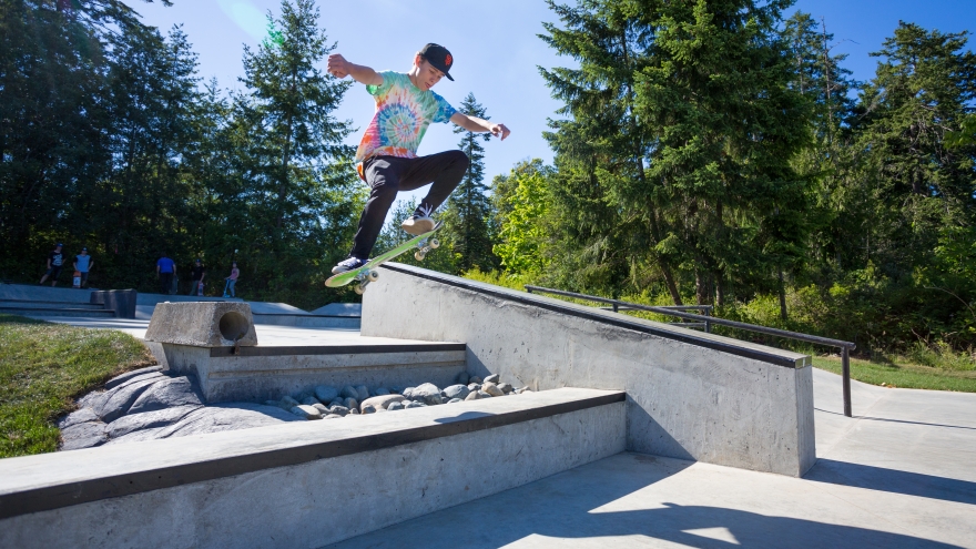 Skateboard going down a rail