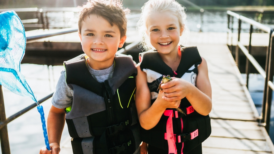 Kids with fish on dock