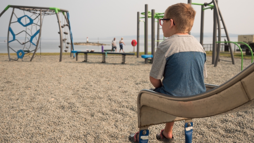 Child on playground slide