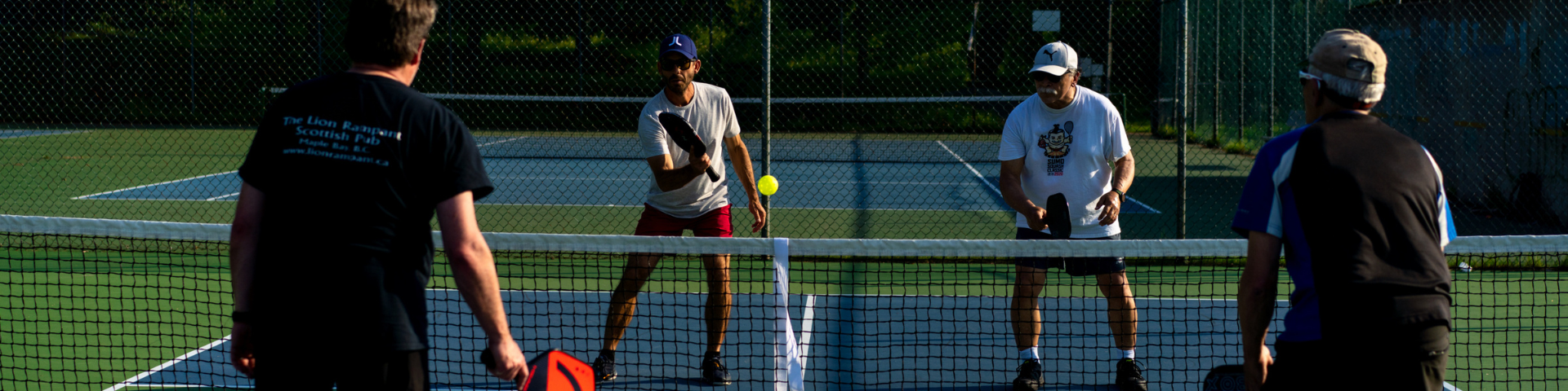 People playing pickleball